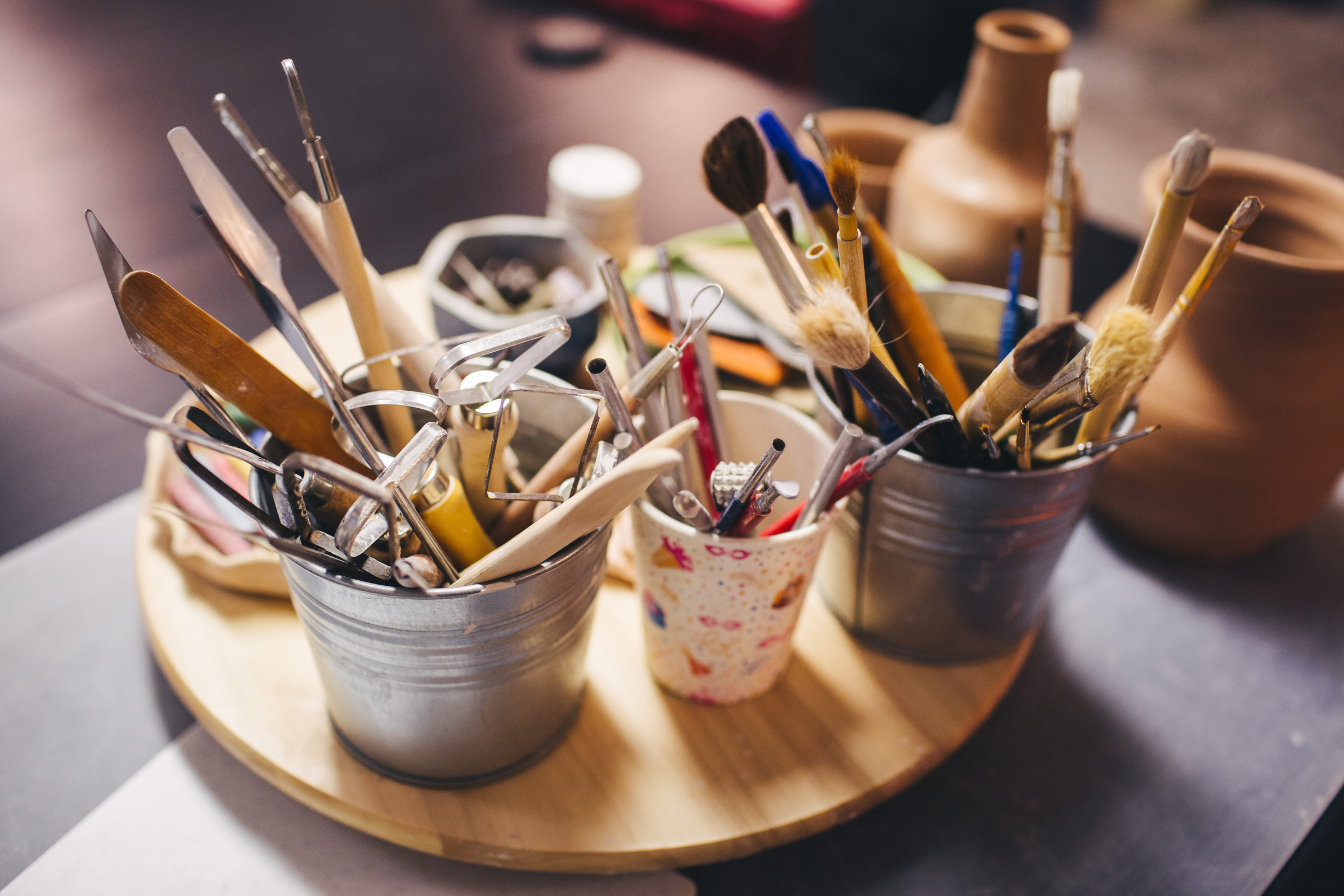 Working place of potter master with accessories